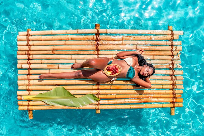 Aruba Bamboo Raft Photo| Videoshoot + Free Cocktails Edits 24Hrs - Floating on a bamboo raft in Noord