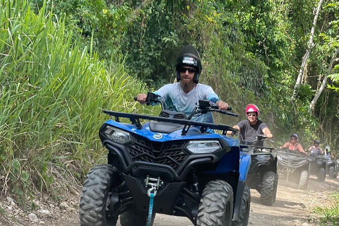 ATV and Bamboo Rafting with Transport from Montego Bay - Bamboo rafting downstream on the Lethe River