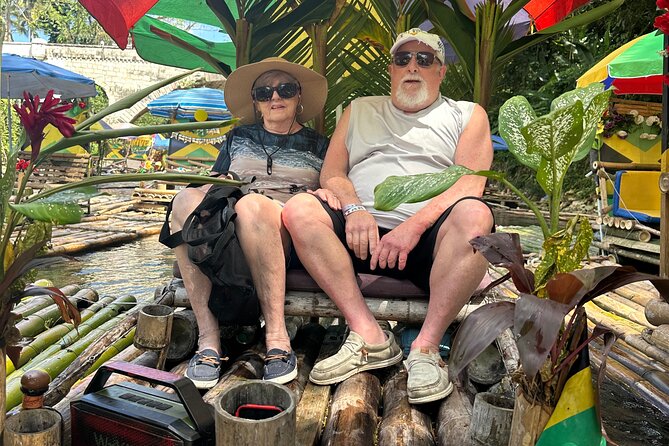 Bamboo Rafting and Limestone Foot Massage from Montego Bay - Climbing Aboard The Traditional Bamboo Raft