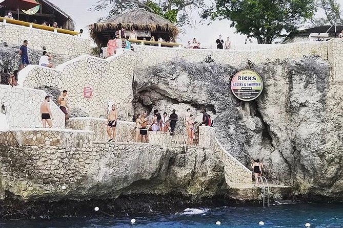 Bamboo Rafting and Limestone Foot Massage with Ricks Cafe Private Tour - What the two stops feel like together