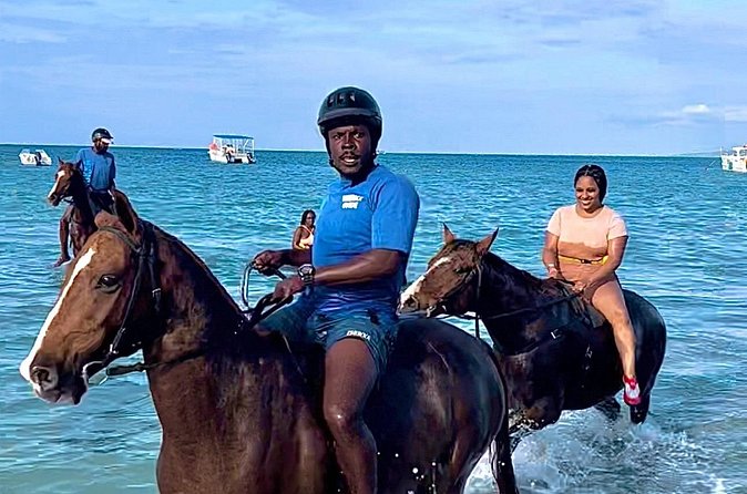 Bamboo Rafting, Dunns River , Zipline And Horseback Ride Combo - White River slows the day with bamboo rafting