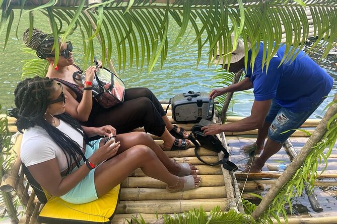Bamboo River Rafting in Ocho Rios - Settling onto the shaded bamboo raft