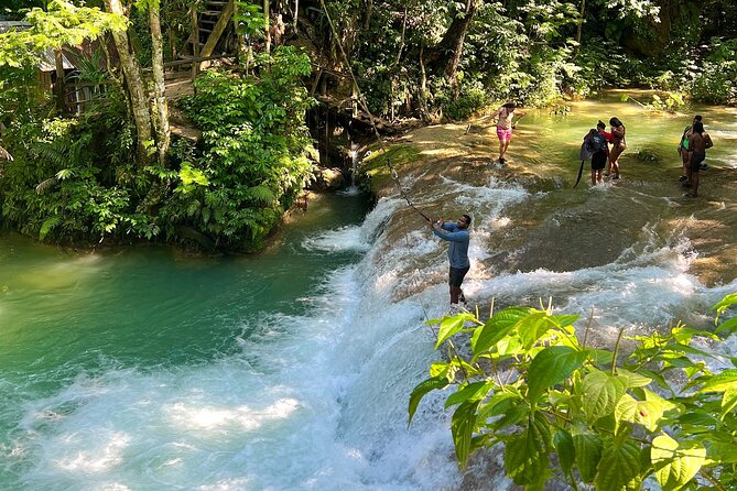 Blue Hole Waterfalls and Bamboo Rafting with Transportation - The river portion: a slower change of pace