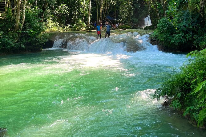 Blue Hole Waterfalls and Bamboo Rafting with Transportation - Lunch, drinks, and the real cost
