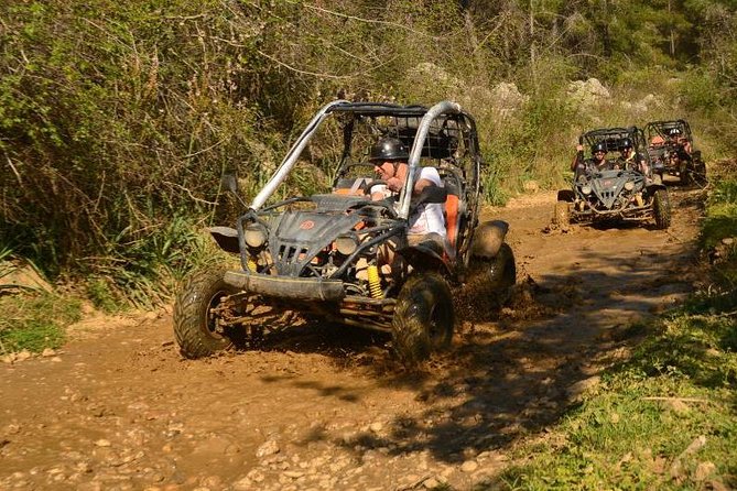 Buggy/Quad & Rafting Combo Tour - Rafting through the canyon river