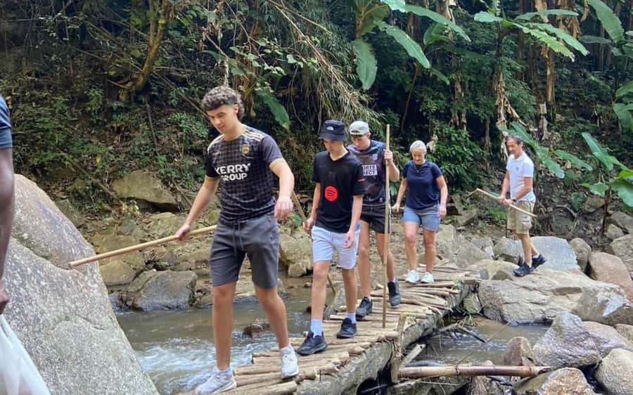 Chiang Mai: ATV Adventure, Jungle Hike & White Water Rafting - A two-hour walk to a waterfall in Mae Taeng