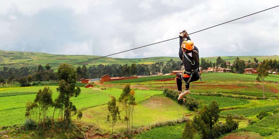 Cusco: Rafting in Cusipata + Zipline over South Valley - Getting ready beside the Cusipata River