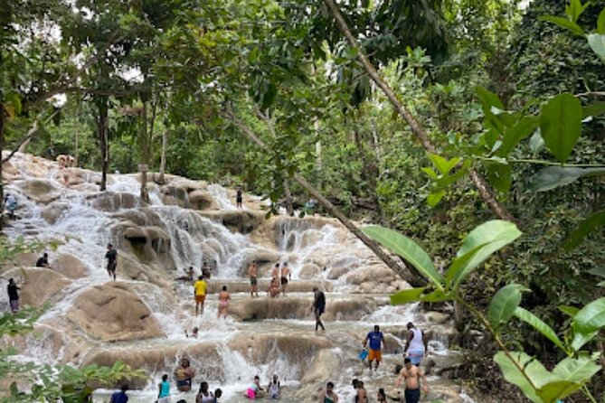 Dunn River Falls and Bamboo River Rafting in Ocho Rios Jamaica. - White River rafting from a 30-foot bamboo raft