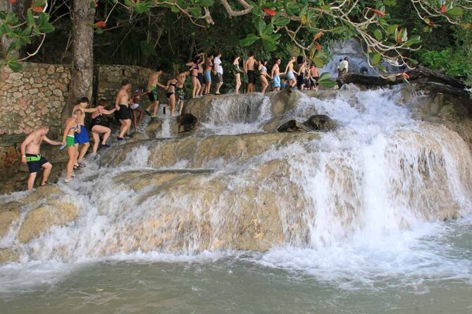 Dunn's River Falls, ATV, Horseback Ride and Bamboo Rafting Tour - Dunn’s River Falls and the opening rush of water