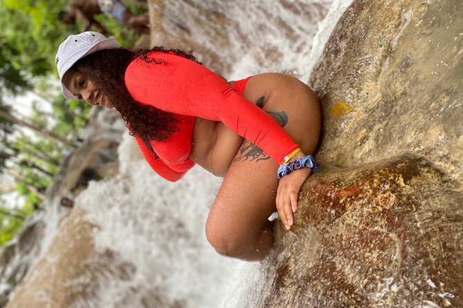 Dunn's River Falls + Bamboo Rafting With Limestone Foot Massage - White River on a 50-foot bamboo raft