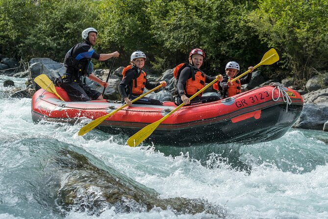 Family Rafting Experience in Engadin - Getting suited up for cold Alpine water
