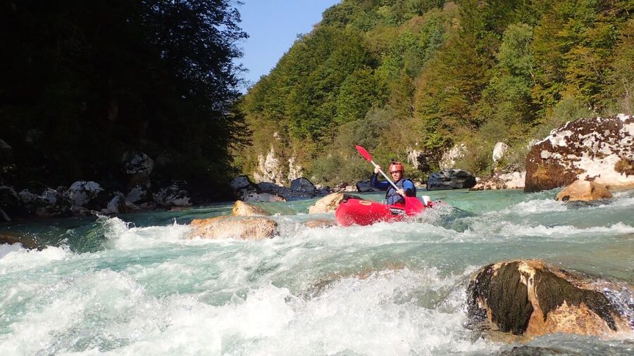 From Bovec: Whitewater kayaking on the Soča River - Following the Soča into class III rapids