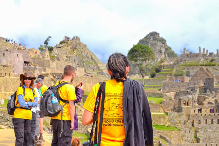 From Cusco: 4-Day Inca Jungle Adventure to Machu Picchu - Day 4: Early buses and the first view of Machu Picchu