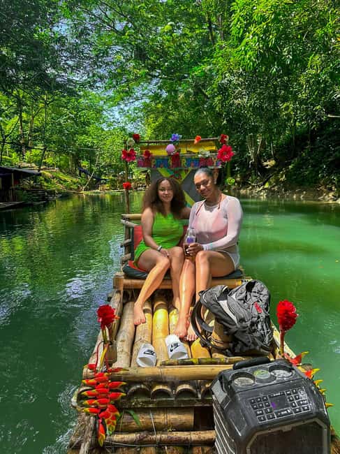 From Montego Bay: Bamboo Rafting & Limestone Massage Tour - Boarding the 30-foot bamboo raft