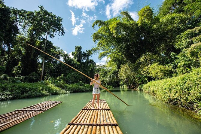 Full Day Martha Brae Rafting & Luminous Lagoon Tour with Dinner - What makes Luminous Lagoon glow