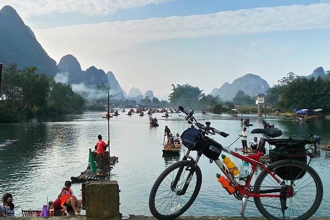Full-day Tour: Cycling, Rafting & SanjieLiu Outdoor Water Theatre - Key points at a glance