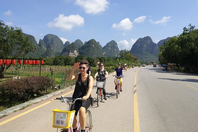 Full-day Tour: Cycling, Rafting & SanjieLiu Outdoor Water Theatre - Moon Hill and the one-hour climb