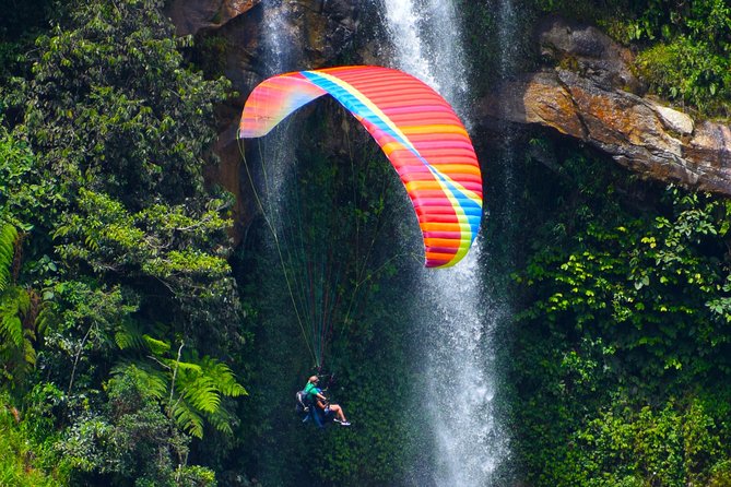 Fun RAFTING + Awesome PARAGLIDING over giant waterfalls from MEDELLIN - Two very different views of Antioquia
