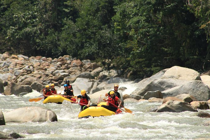 Fun White Water Rafting (Optional Paragliding) Private Tour from Medellin - Gearing up beside the Calderas River