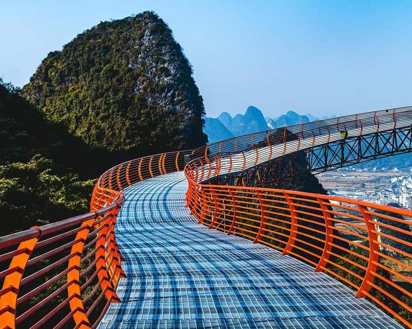 Guilin: Cave, Yulong Rafting, Glass-bottomed skywalk & Show - Yulong River: a quiet 40-minute bamboo raft ride