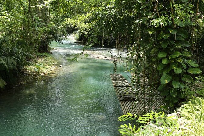 Half-Day Martha Brae Rafting Tour with Pickup Included - Boarding the 30-Foot Bamboo Raft
