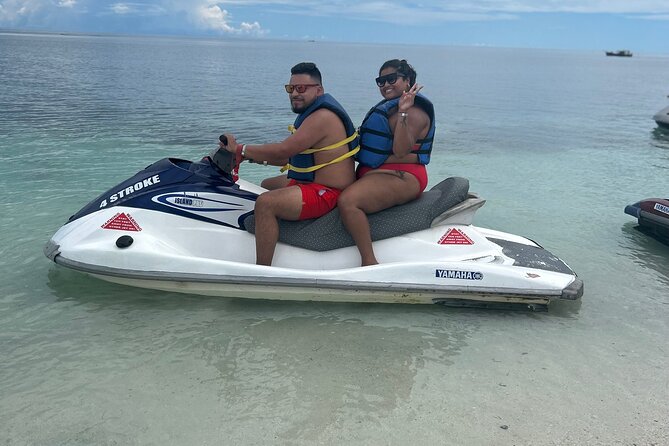 Jet Ski and Bamboo Rafting Limestone Massage From Montego Bay - Jet skiing on Montego Bay’s clear water