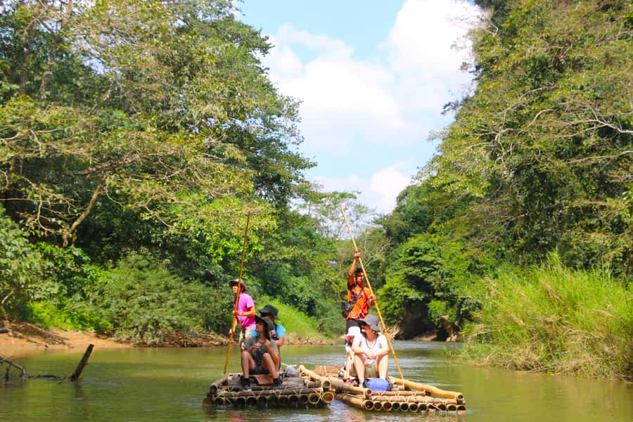Khao Lak: Khao Sok Bamboo Rafting and Elephant Bathing Trip - Bamboo rafting beneath the limestone cliffs