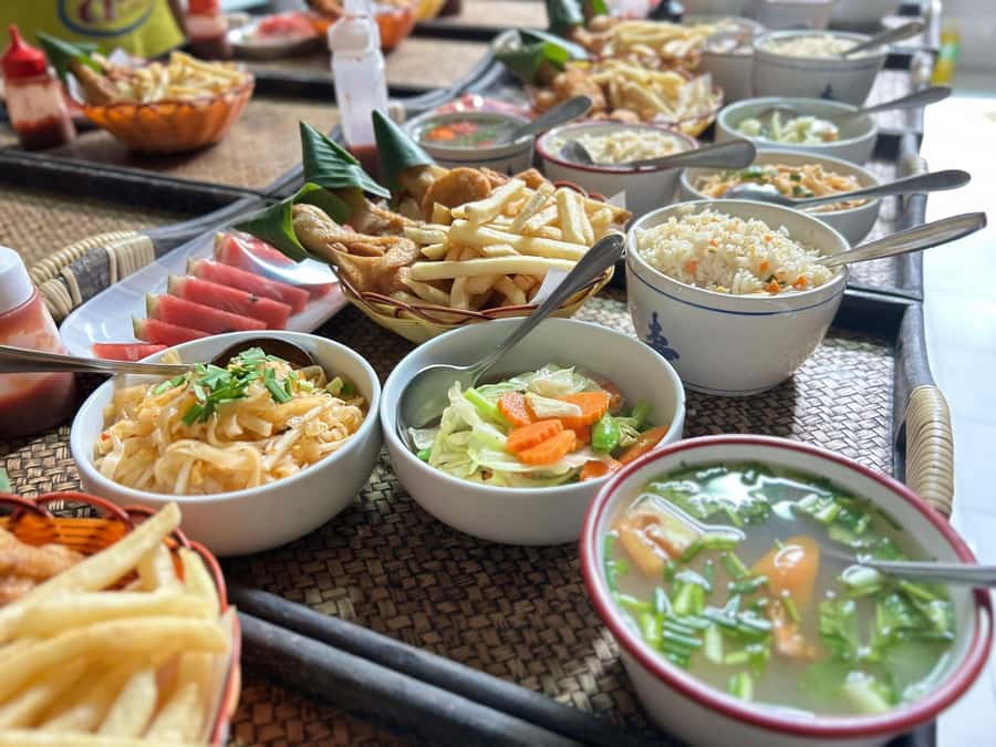 Khao Lak: White Water Rafting, Zipline and Elephant Feeding - Feeding rescued elephants after lunch