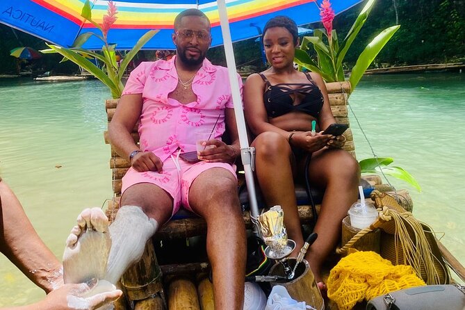 Montego Bay Bamboo Rafting Tour with Limestone Foot Massage - River views, swimming, and riverside stops