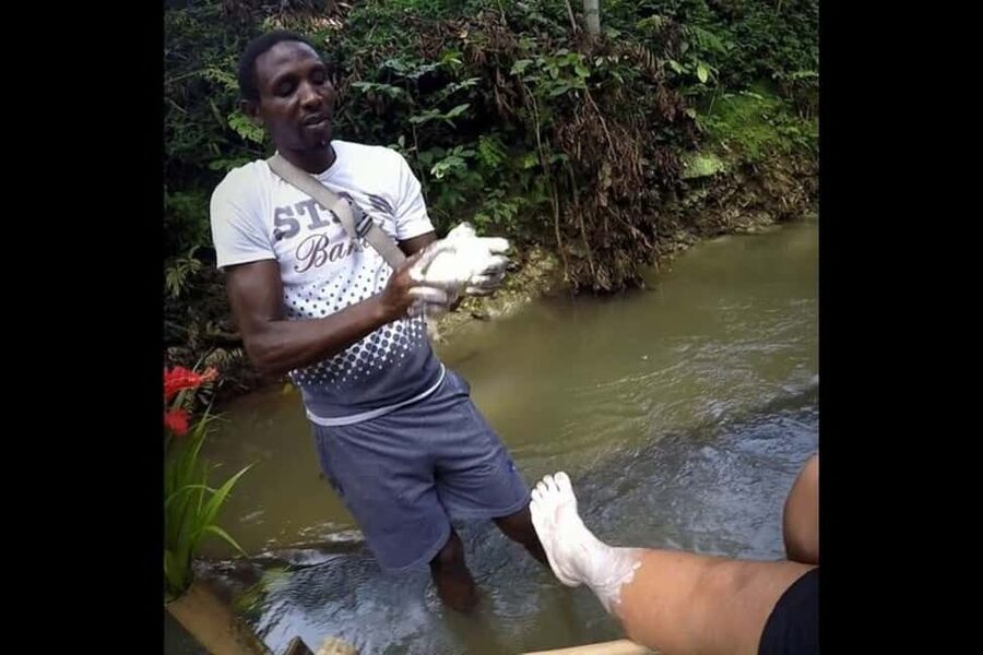 Montego Bay: Bamboo River Rafting and Limestone Foot Massage - The limestone foot massage beside the river