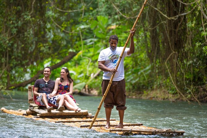 Montego Bay Highlight and Shopping Tour With Bamboo River Rafting - Swimming, limestone, and the jungle socks foot massage