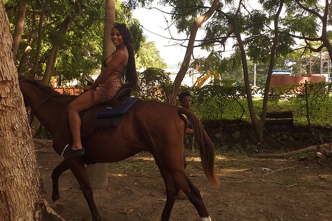Private & Customize Tour to Martha Brae Rafting and Horseback Riding N Swim - Martha Brae River: bamboo rafting in Trelawny