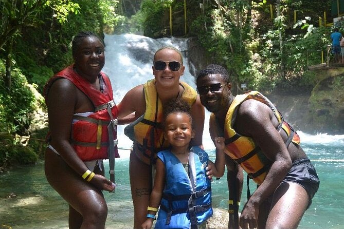 Private Transport to River Tubing or Rafting and Blue Hole combo - Blue Hole swimming, rock ledges, and secret falls