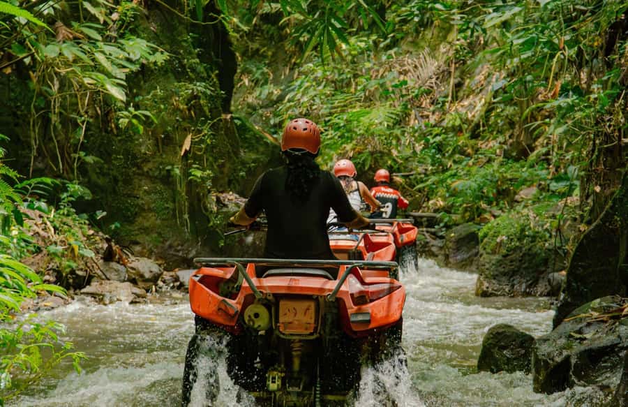 Quad bike bali tunnel waterfall with Rafting - A full day in Bali’s rural interior