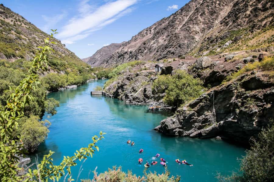 Queenstown: White Water Surfing Along the Kawarau River - Getting suited up for cold river water