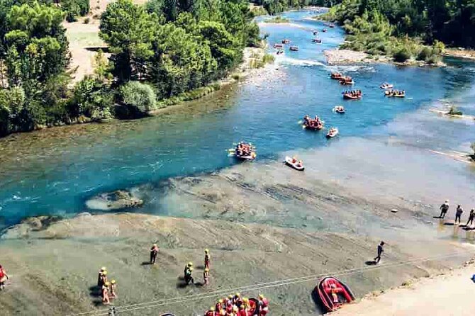 Rafting, Quad Safari, & Zipline Combo Experience with Lunch - Rafting through the cold river