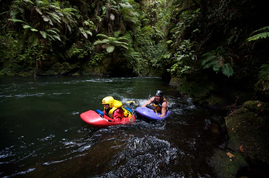 Rotorua Sledging: Kaituna White Water River Board Experience - Getting suited up with a small group