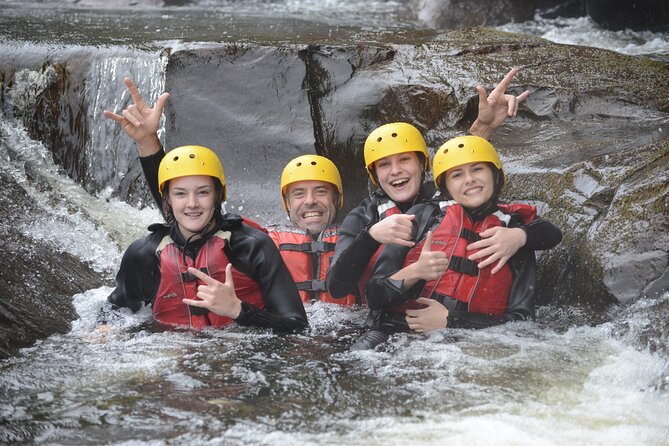 Rouge River Classic Whitewater Rafting Package - Calm pools, river scenery, and short rests