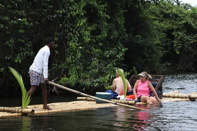 St. Lucia Private Bamboo Rafting Experience - Boarding a bamboo raft with a personal guide