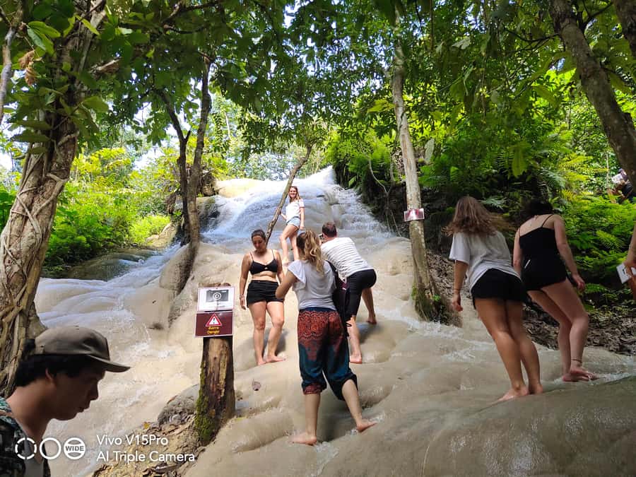 Sticky waterfalls- Elephants- Bamboo or White water rafting. - Lunch at a local restaurant or the sanctuary