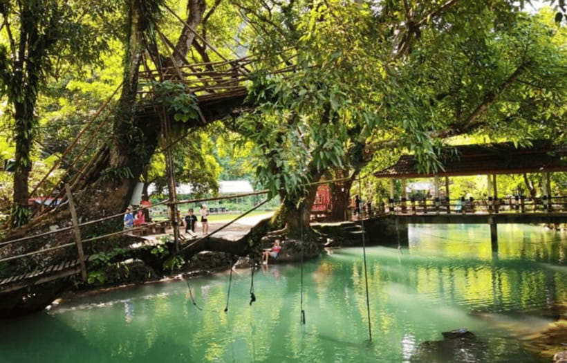Vang Vieng:Zipline,Water Cave,Tham Chang,Kayak,Blue Lagoon 3 - Tham Chang Cave: Walking, Swimming, and Tire Rafting