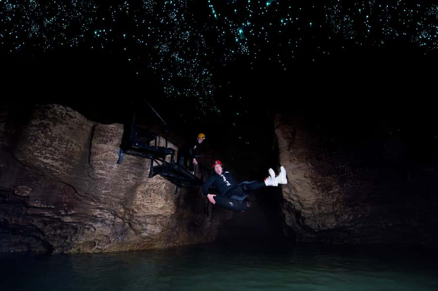 Waitomo Caves: Labyrinth Black Water Rafting Experience - The first underground section: scrambling, climbing, and water