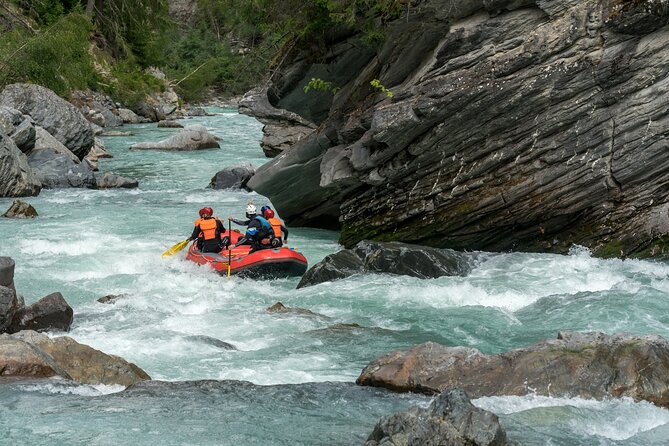 Whitewater Action Rafting Experience in Engadin - Swimming, playing, and a possible cliff jump
